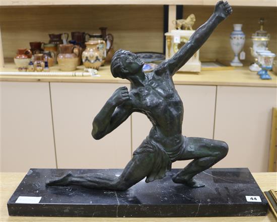 A bronze model on marble base of an archer length 56cm